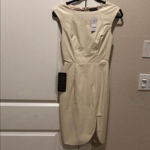 Bebe cream faux leather fitted midi dress. NWT